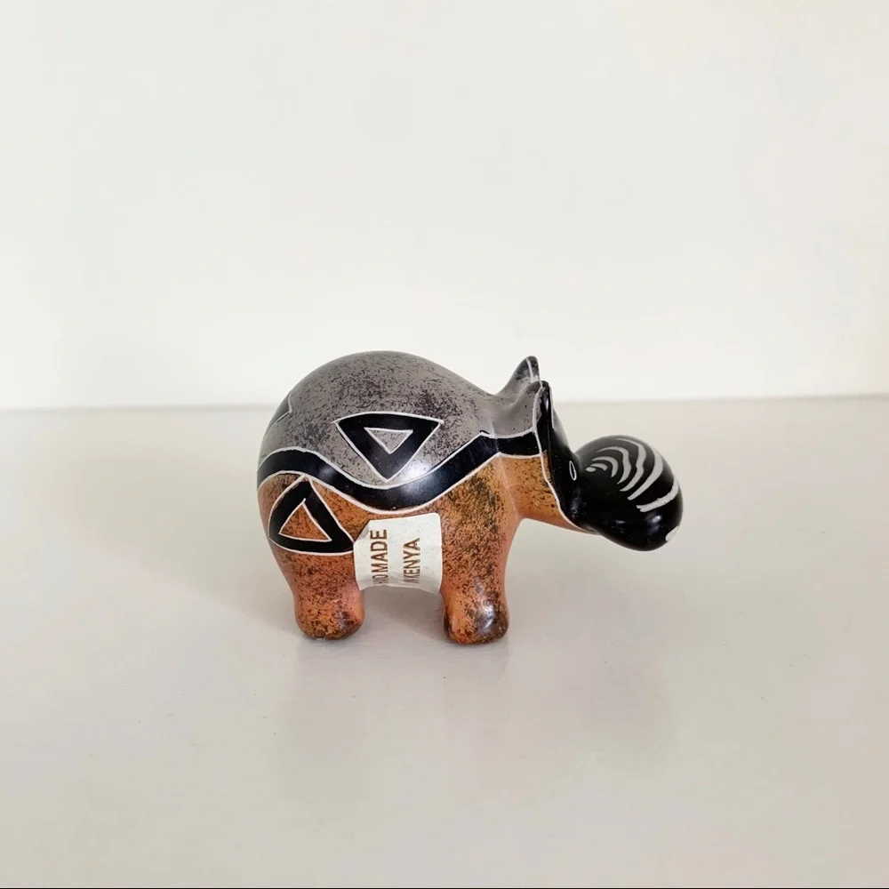 Stone hippo statuette